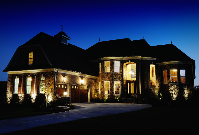 Standby generator powering a home during nighttime outage